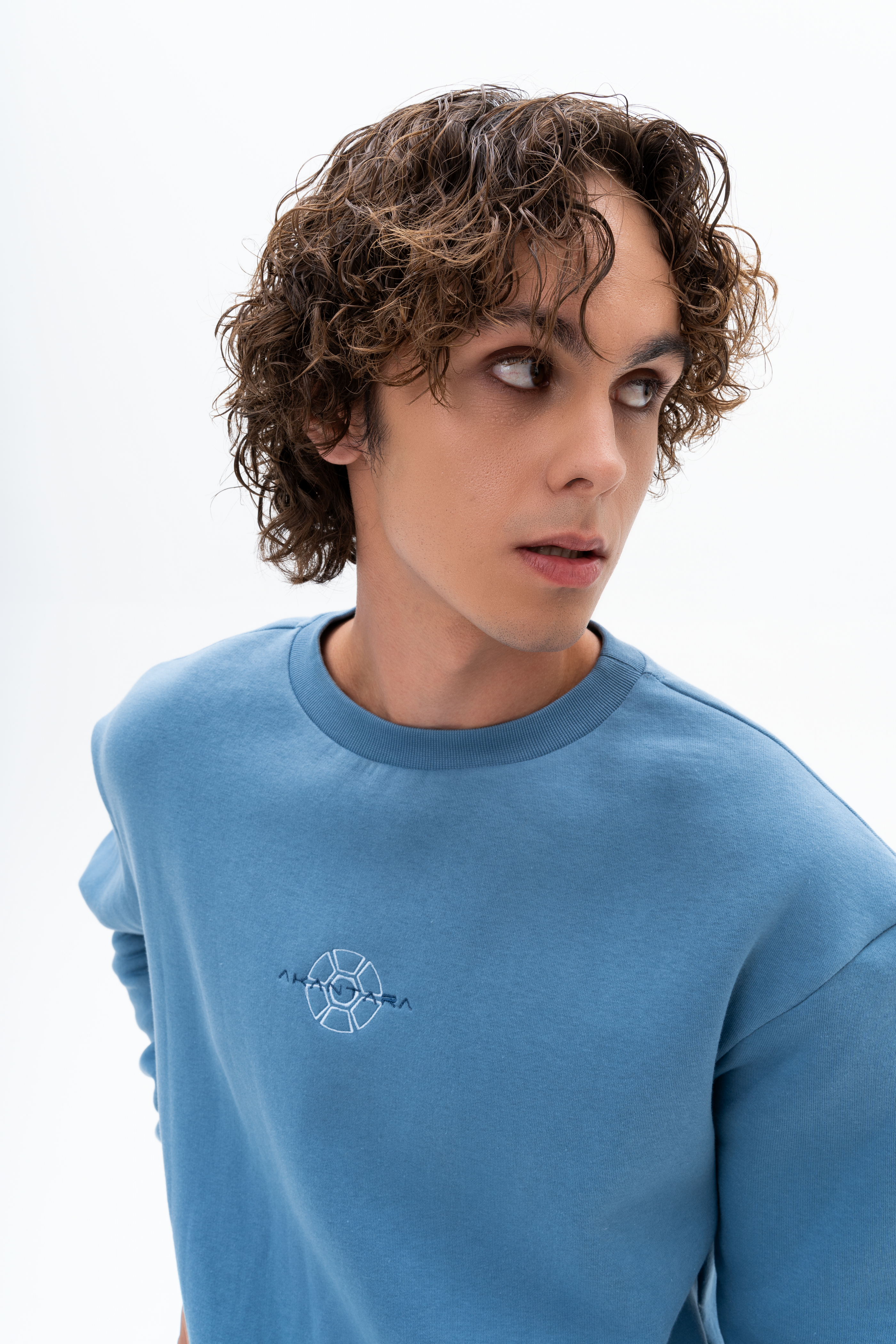 Close-up of AKANTARA Basic Crewneck Sweatshirt fabric, showcasing premium ethically sourced cotton blend