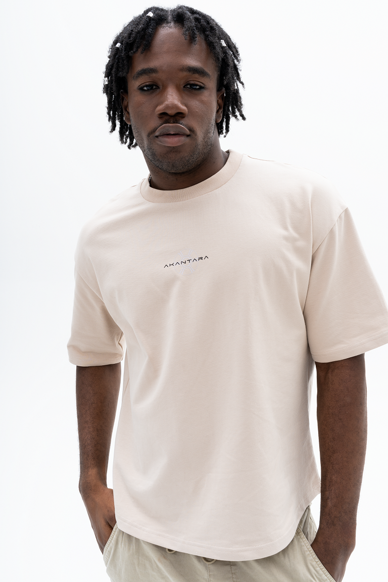 Model wearing AKANTARA Octopus Print T-Shirt, styled with casual streetwear for men and women