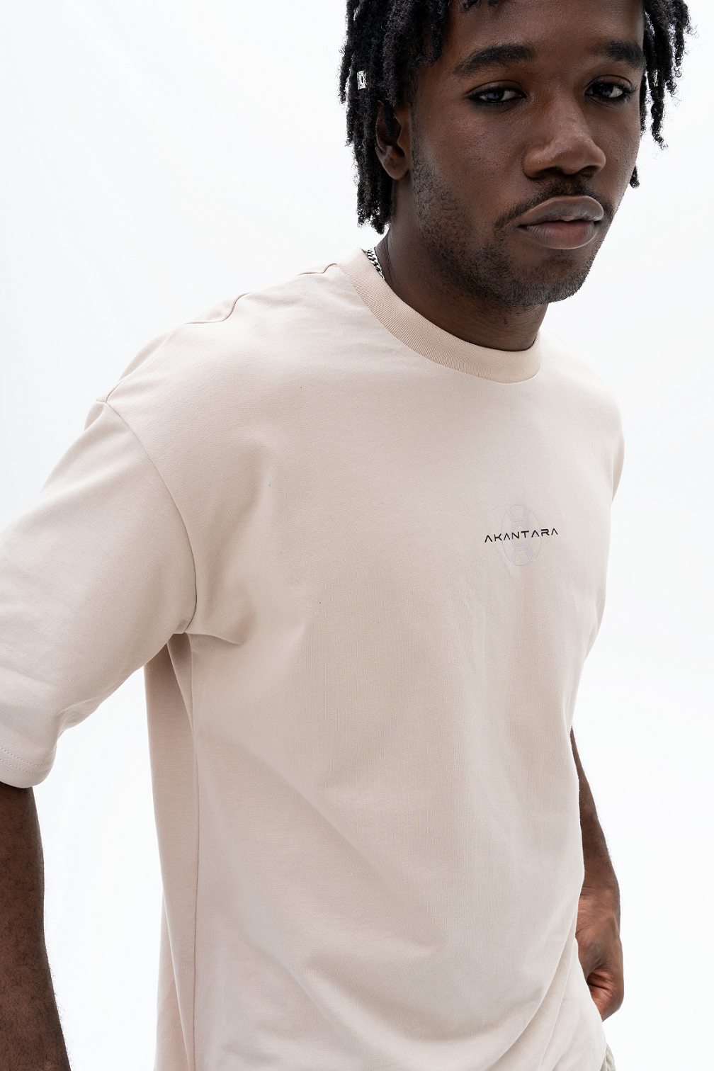 Model wearing AKANTARA Octopus Print T-Shirt, styled with casual streetwear for men and women
